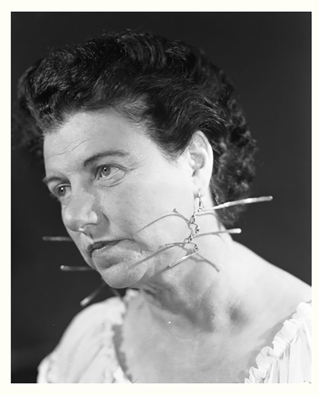 Peggy Guggenheim wearing earrings by Alexander Cal
