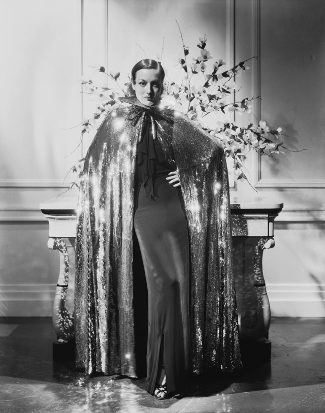 Joan Crawford wearing Gilbert Adrian in Sadie McKee (1934)