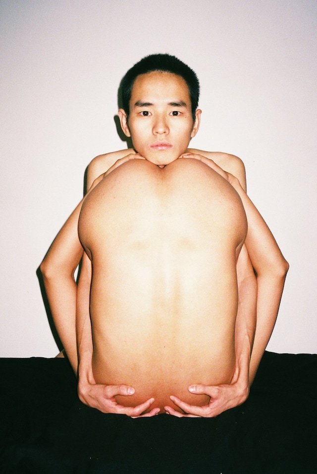 Ren Hang photography peacock naked nature China