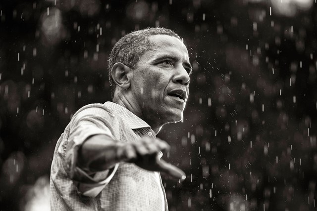 © Brooks Kraft: President Barack Obama campaigns in the rain