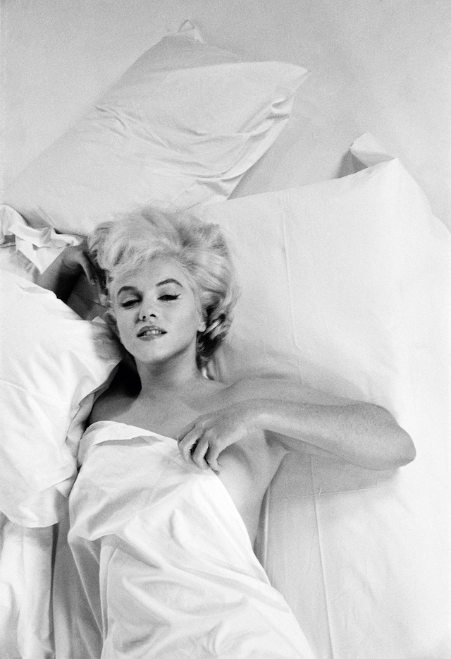 &#169; Eve Arnold Estate, Marylin Monroe rests between 