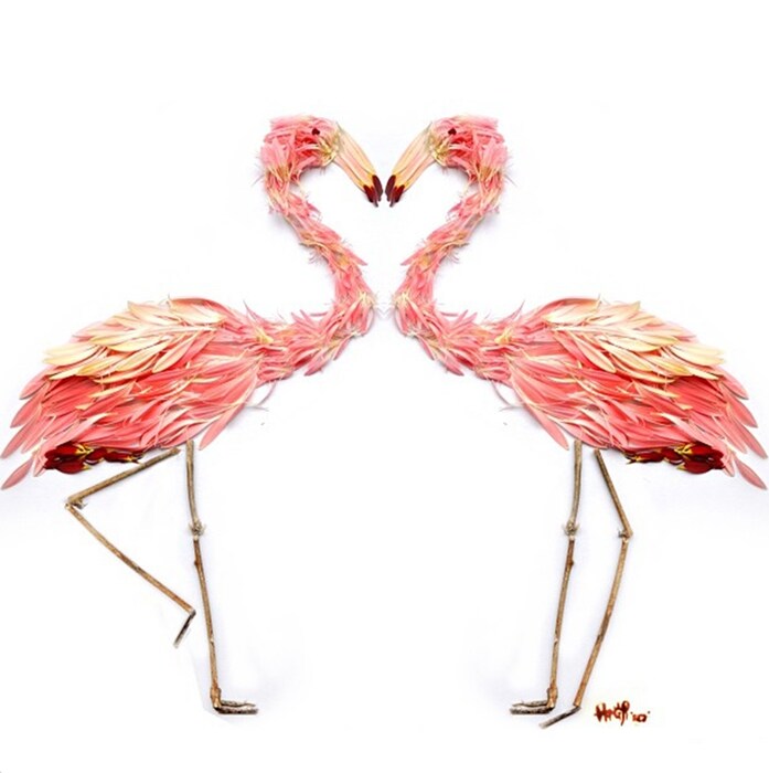 Flamingos made from pink gerbera petals and twigs