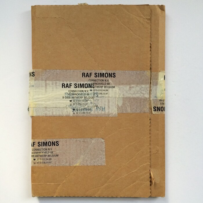 The box for Isolated Heroes by Raf Simon and David Sims (sad