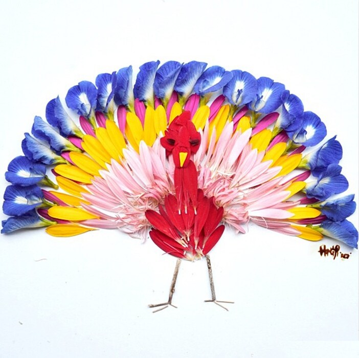 Peacock made from gerberas and butterfly pea flowers