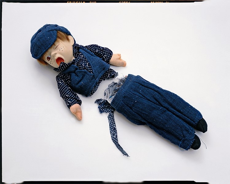 Cornelia Parker, Shared Fate (Oliver), 1998. Doll cut in hal