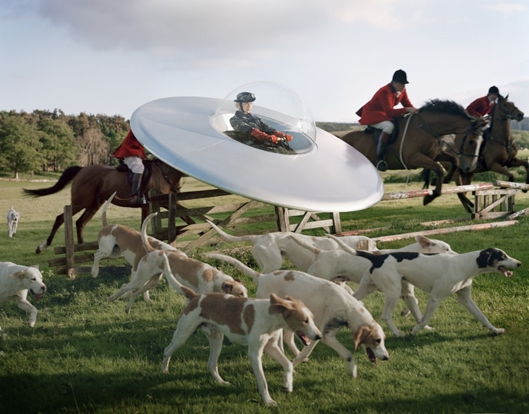 Kinga Rajzak in flying saucer with members of the West Percy