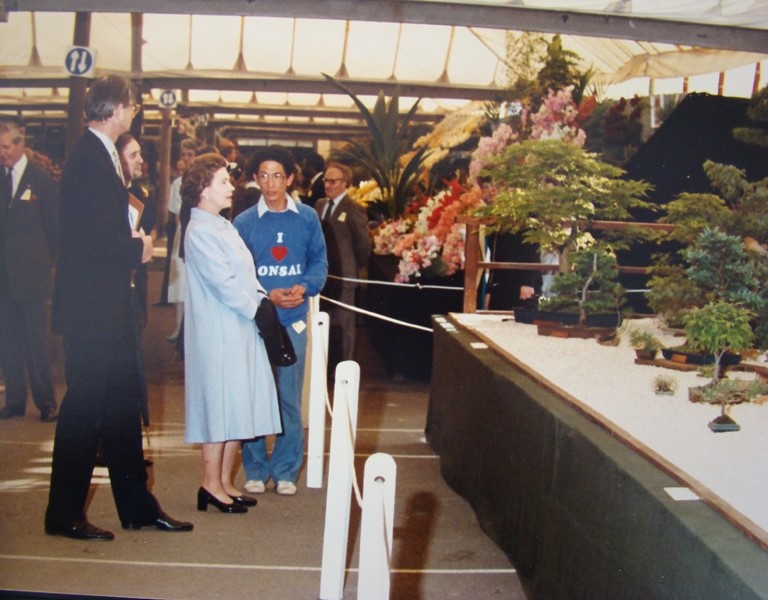 Peter Chan with the Queen, 1984