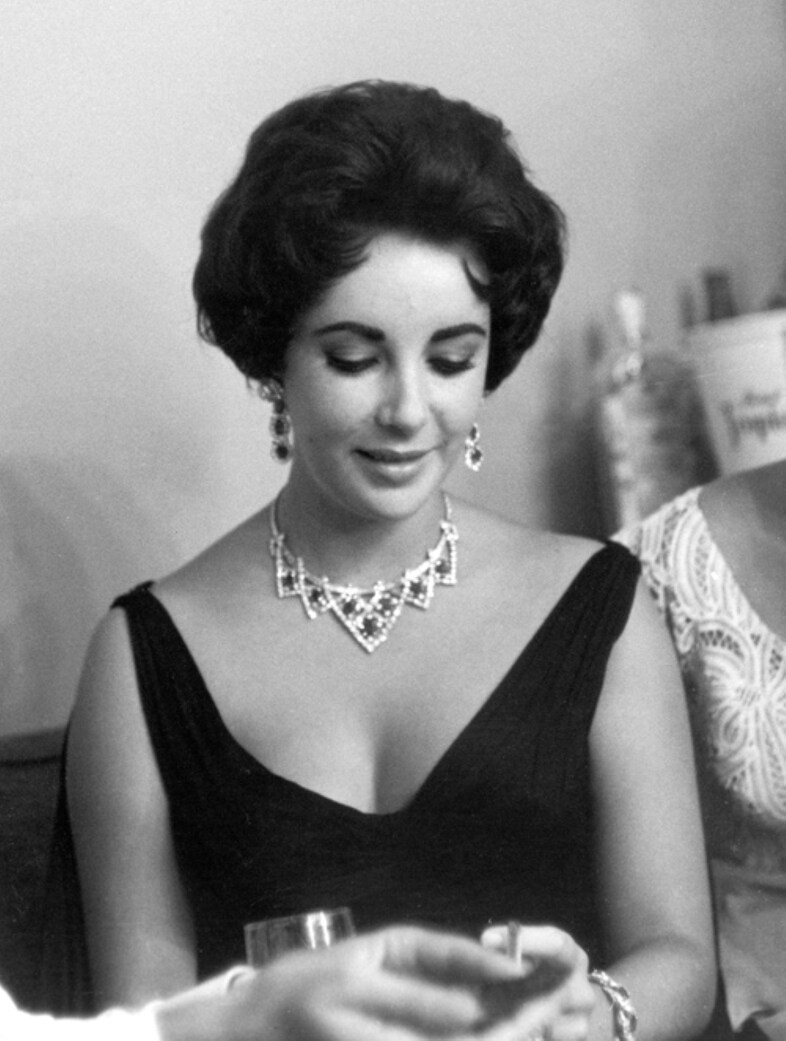Elizabeth Taylor in a ruby and diamond necklace &amp; earrings