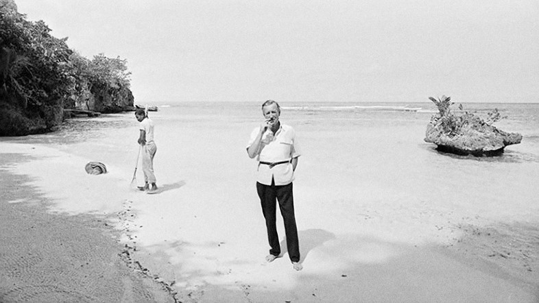 Ian Fleming on the beach at Goldeneye, Jamaica