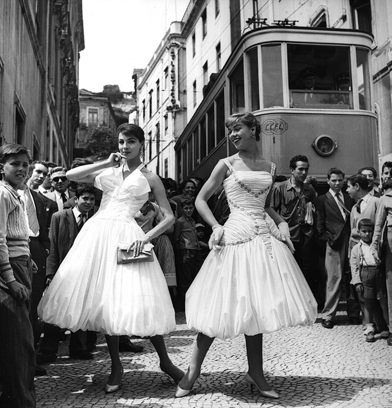 Two models in dresses designed by Jole Veneziani, 1956