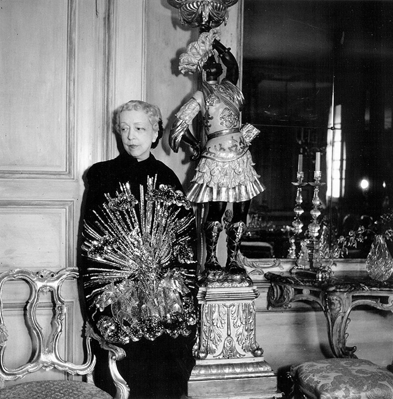 Elsie de Wolfe in her Paris apartment wearing a Schiaparelli