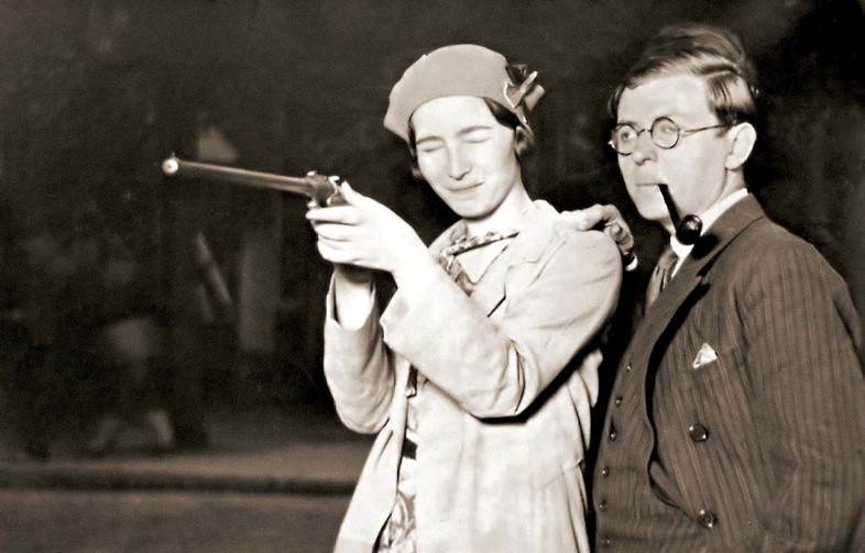 Simone de Beauvoir and Jean-Paul Sartre shooting a gun, 1929