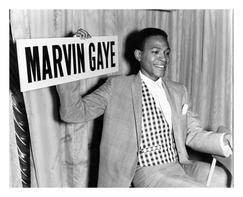 Marvin Gaye holding a sign, 1964