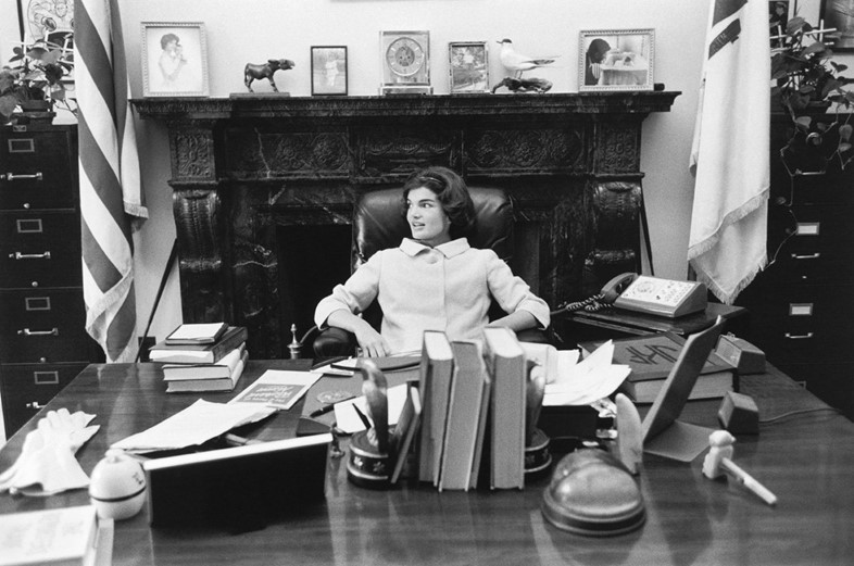 Jackie sits at JFK’s senate desk, Washington DC, 1