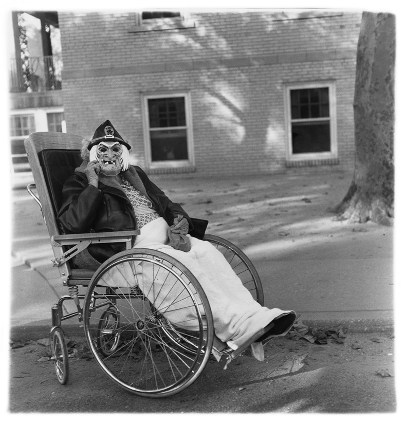 2_Arbus_Masked woman in a wheelchair, Pa. 1970