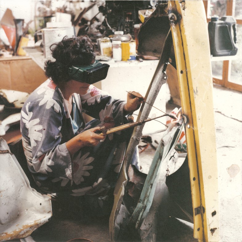 Feliza Bursztyn welding in her studio, ca 1980 Pho