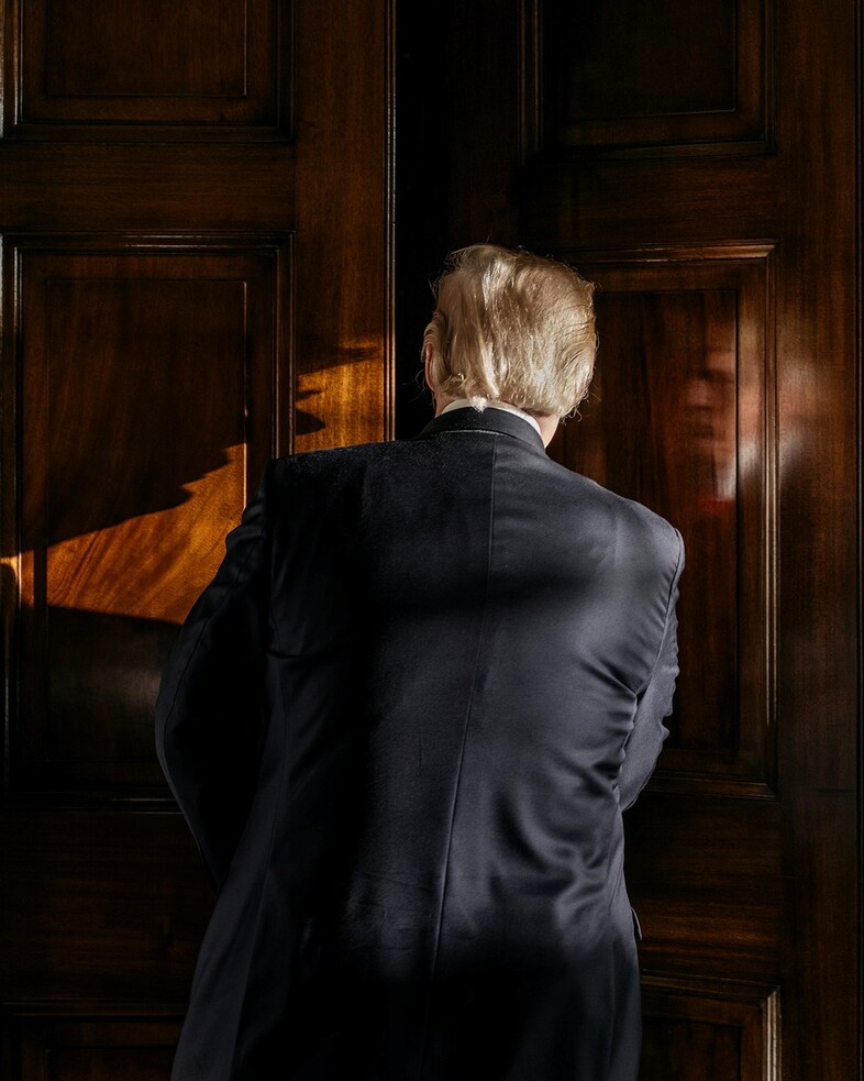 web President Donald Trump enters his private livi