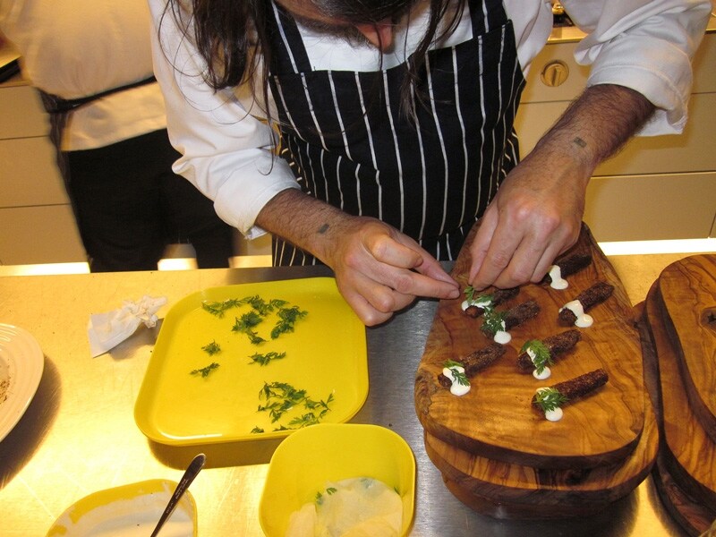 Nuno Mendes prepares carrots rolled in breadcrumbs with hors