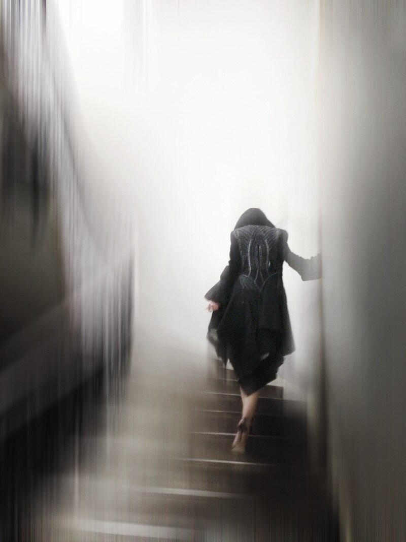 Coat by Alexander McQueen, S/S 2003; Black frock coat with f
