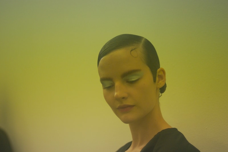 Model backstage at Prada