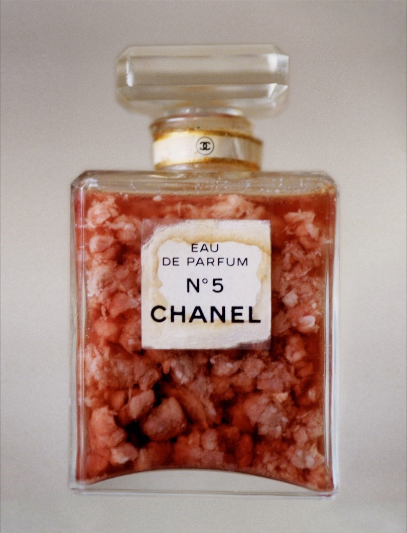 42 - CHANEL NO.5 PERFUME BOTTLE WITH RAW MEAT