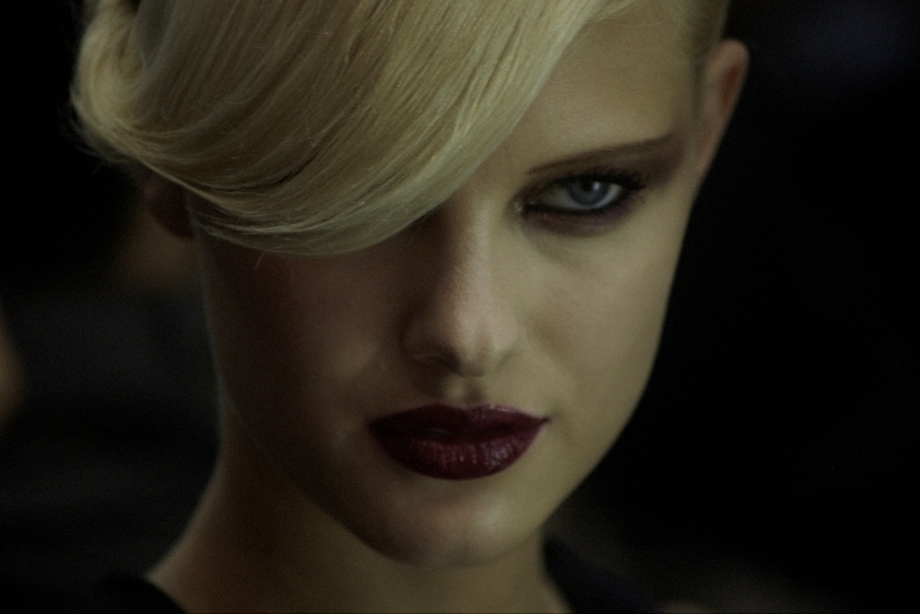 Model backstage at Louis Vuitton