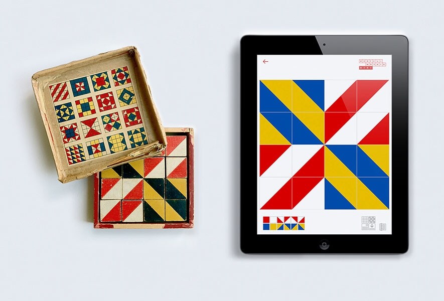 W&#252;rfel-Mosaik vintage game along with the corresponding app 