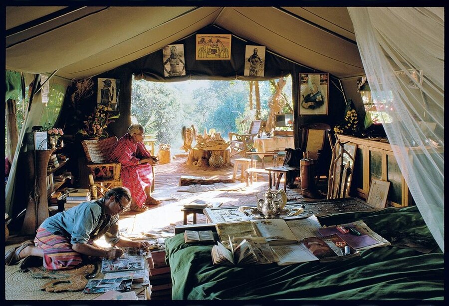 Peter Beard at work on a diary, the Beards’s bedroom tent, H