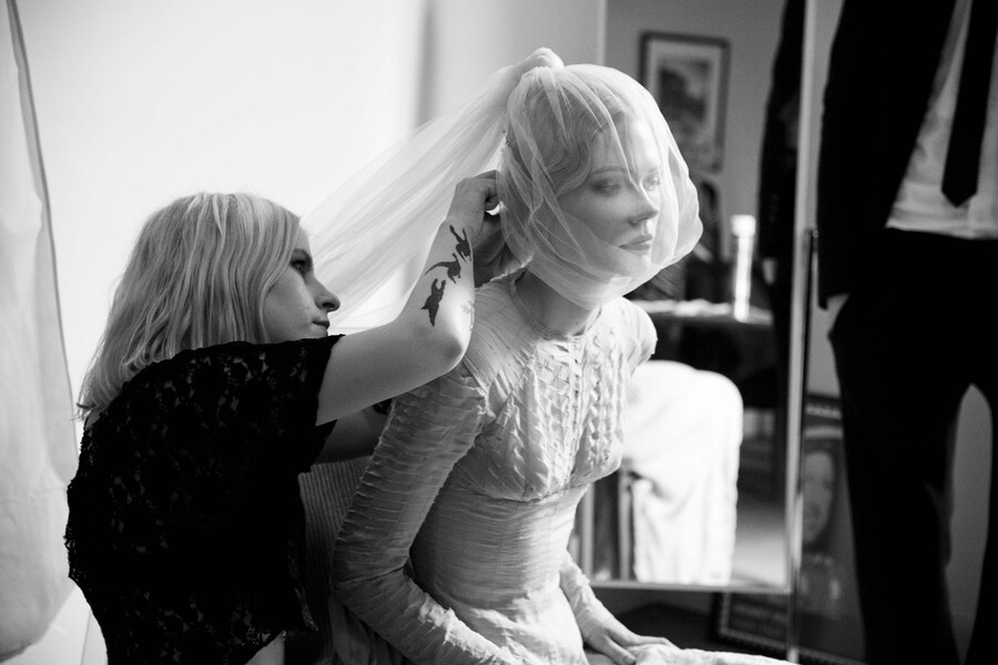 Hairdresser Alex Brownsell fixing Stephen Jones&#39; veil immedi