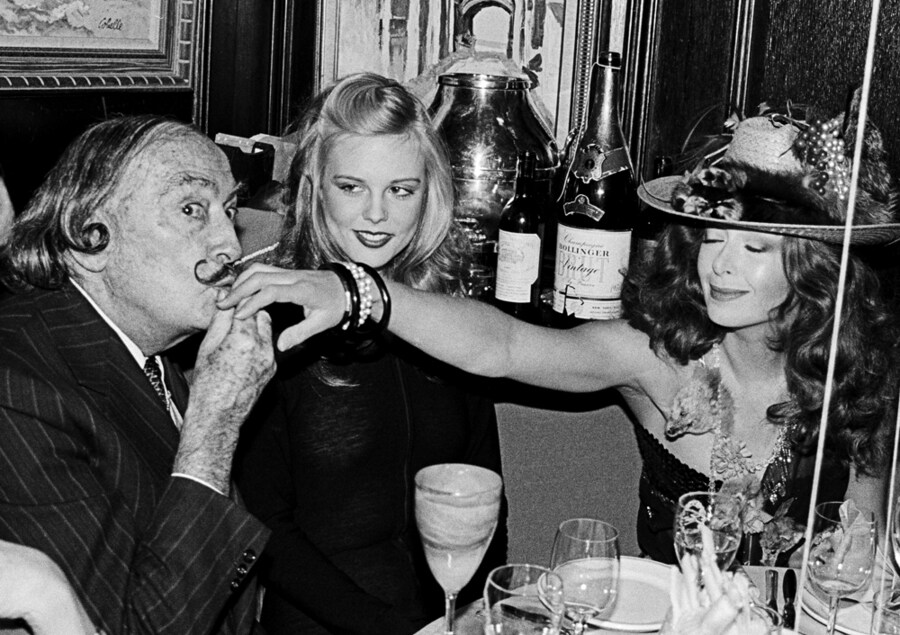 Salvador Dali, Janet Daly and the recipient of a kiss, NY 19
