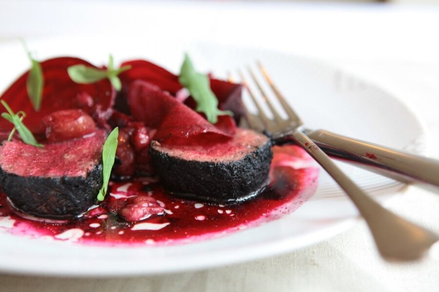 Loin of venison rolled in ash with smoked bone marrow and be