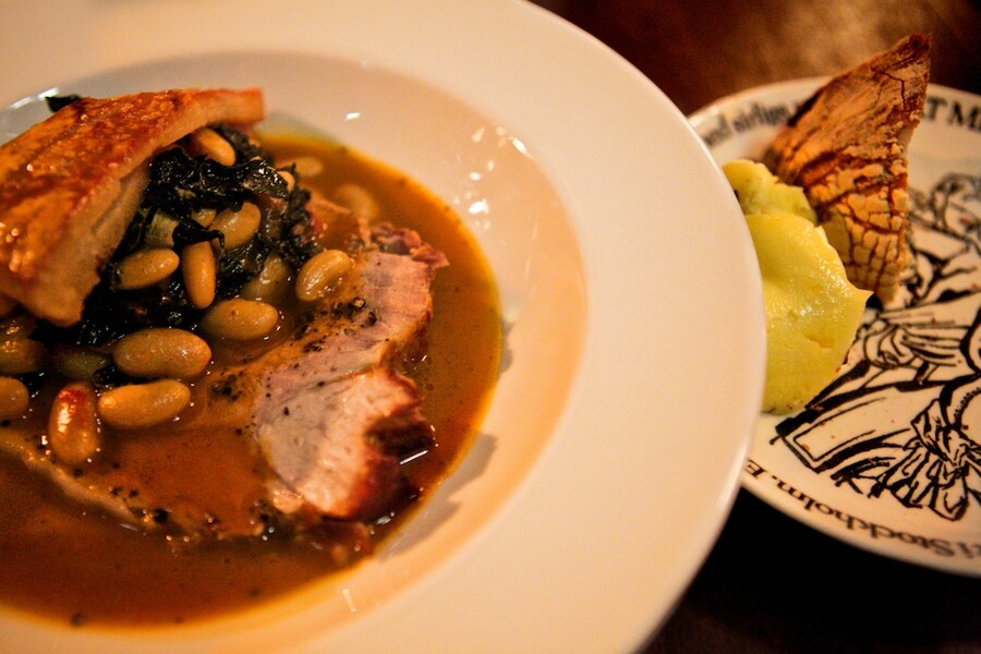 Pork neck with cannellini beans
