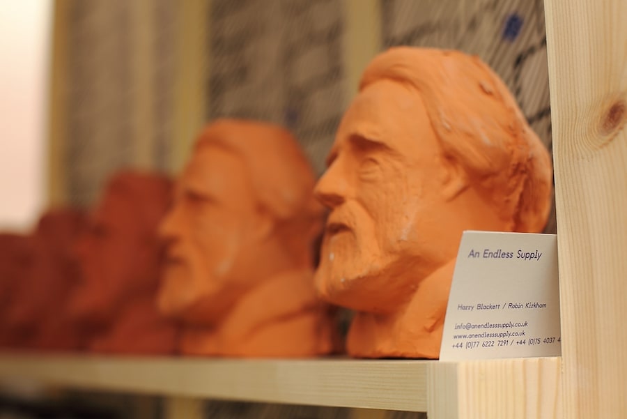 Terracotta penny-bank busts of John Ruskin at the colosseum
