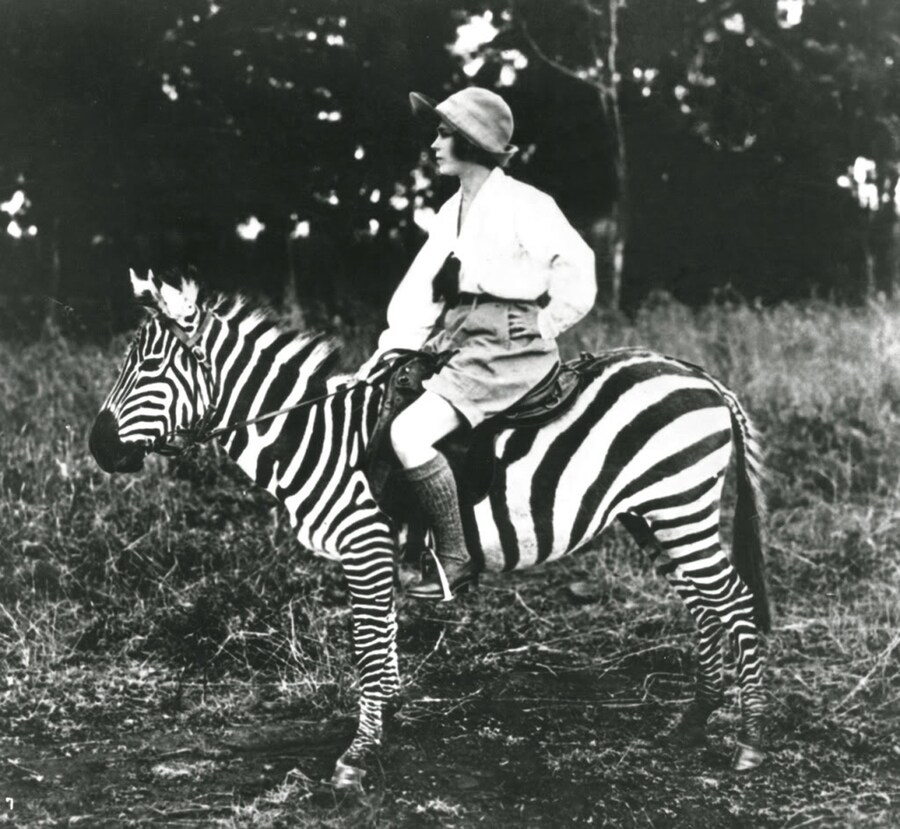 Osa Johnson riding a zebra