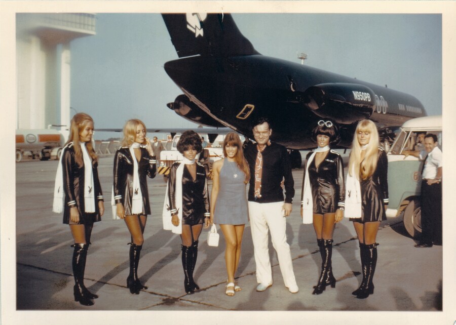 Barbie Benton and Hefner, with Jet Bunnies in Los Angeles, 1