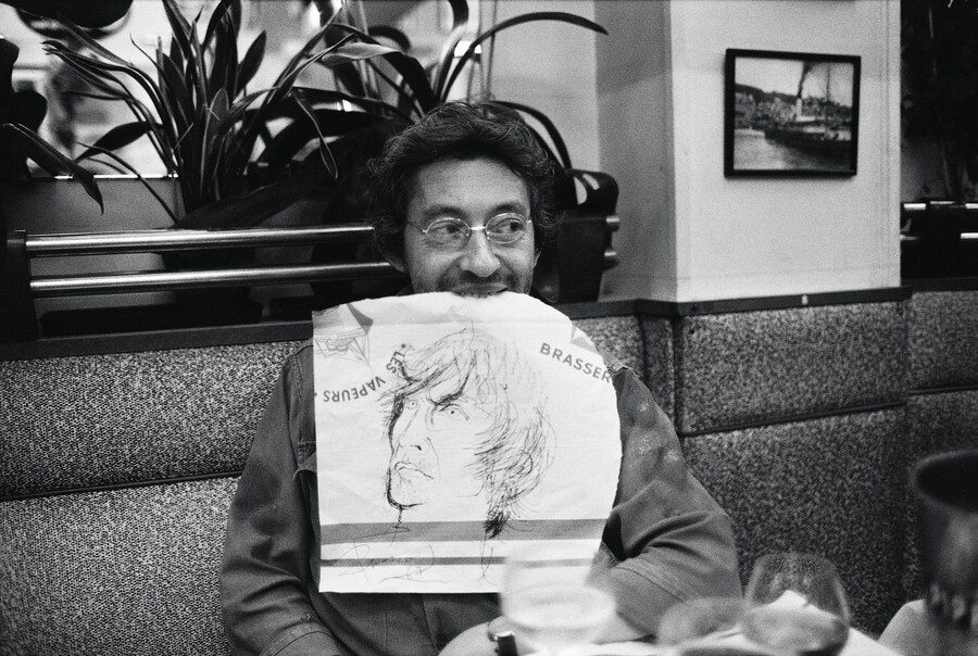 Serge sketching Andrew in a Trouville restaurant, 1977