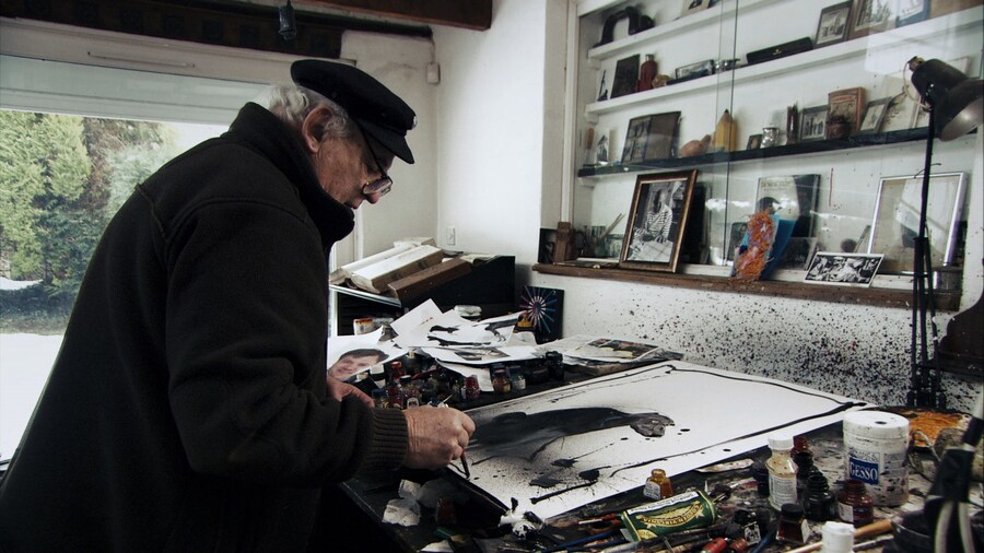 Ralph Steadman with artwork of Beanie the dog