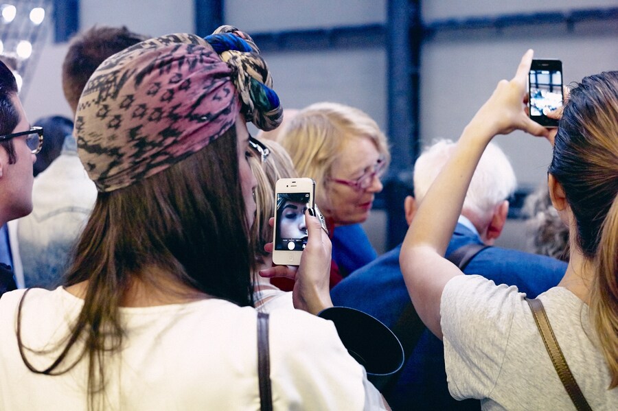 On the Phone at London Fashion Week S/S15