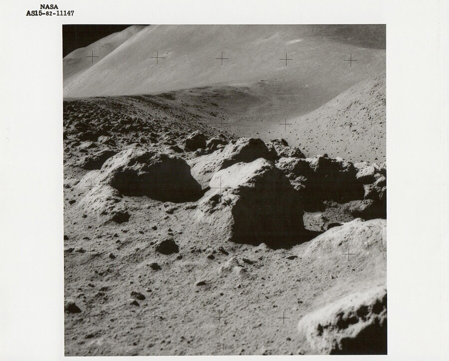 Lunar boulders, St. George Crater beyond, Apollo 15, July 19