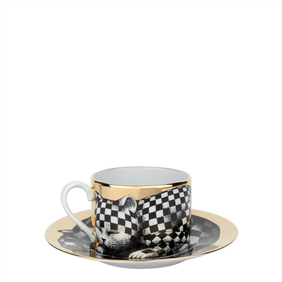 Hand-painted teacup by Fornasetti