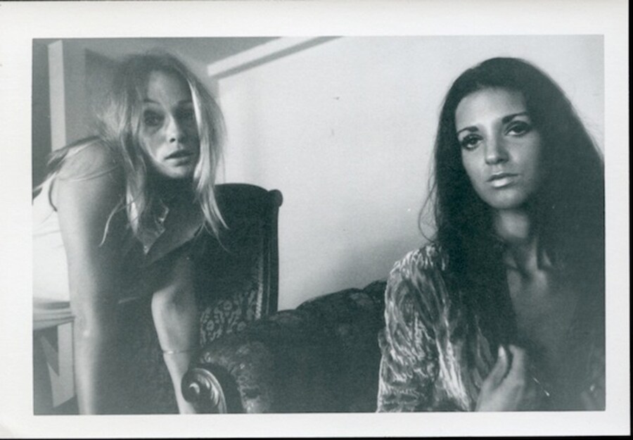 Untitled (blonde and brunette dressed)