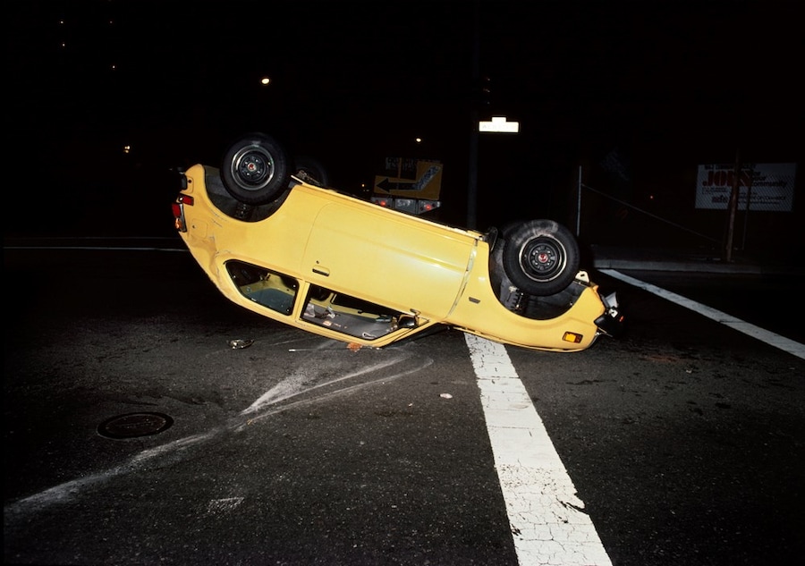 041_Upside_down_yellow_car_1980