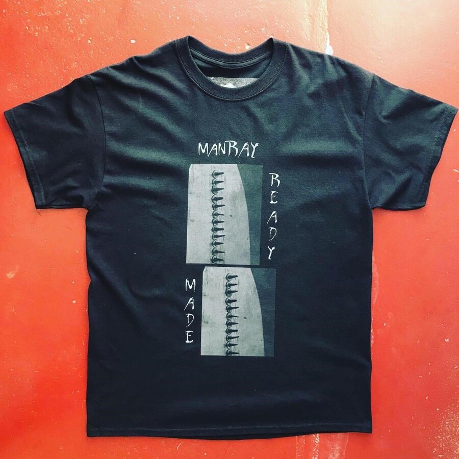 Man Ray Ready Made T Red Background