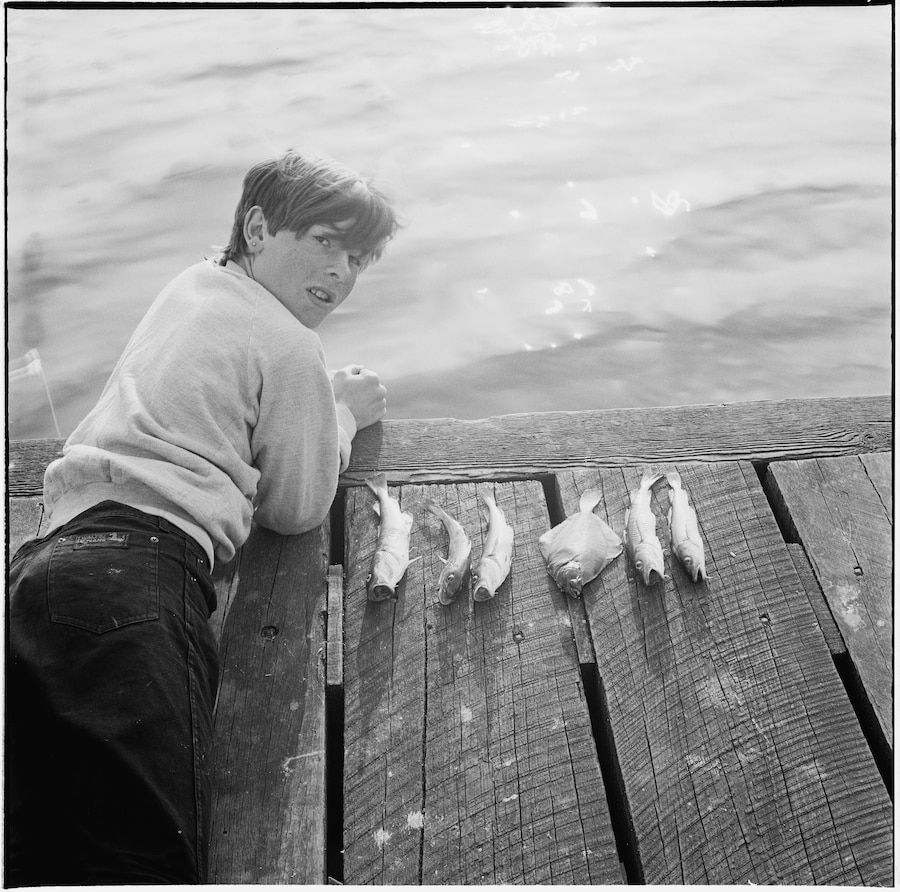 Boy with fish, Seacombe Docks, 1980