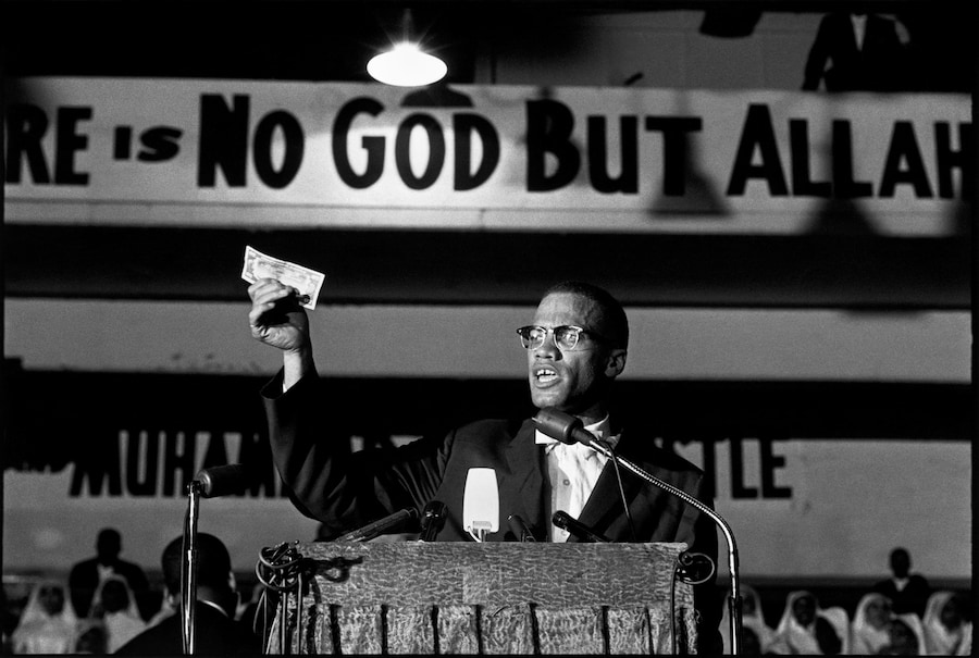 &#169; Eve Arnold Estate, Malcolm X at a Black Muslim r