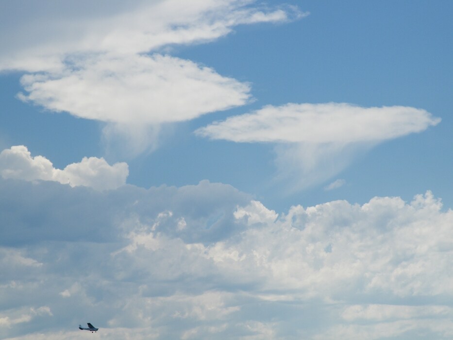 A pair of Jellyfish clouds over Woodland Hills, Washington S